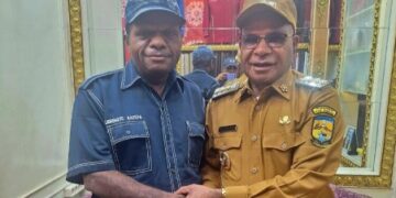 Papuan political figure Laurenzus Kadepa (left) with Puncak Regent Elvis Tabuni. – Courtesy of Jubi