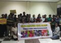 Group photo following the public discussion “Rising Against National Strategic Projects (PSN) and Militarism,” organized by Suara Perempuan Papua Bersatu in Perumnas 3 Waena, Jayapura City, Papua — Jubi/Aida Ulim