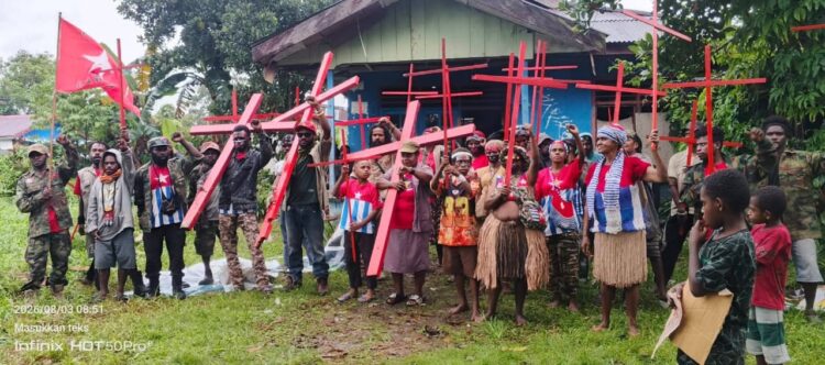 Salib merah KNPB Mimika